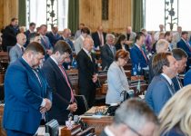 Members of the House bow for a prayer Tuesday, July 18, 2023, during the veto override session at the State Capitol in Baton Rouge.